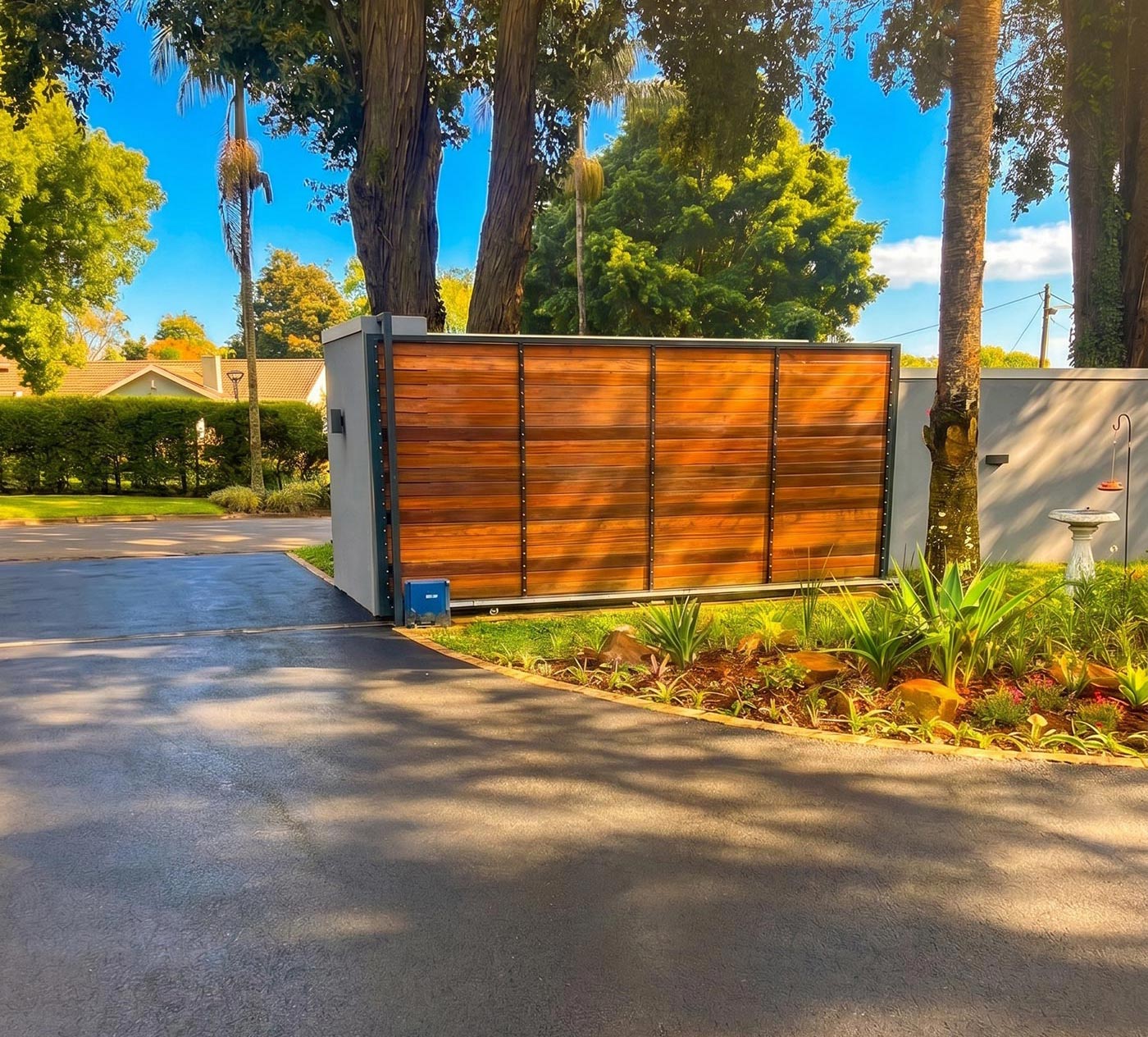The wooden security gate at the entrance to the Home Angels property